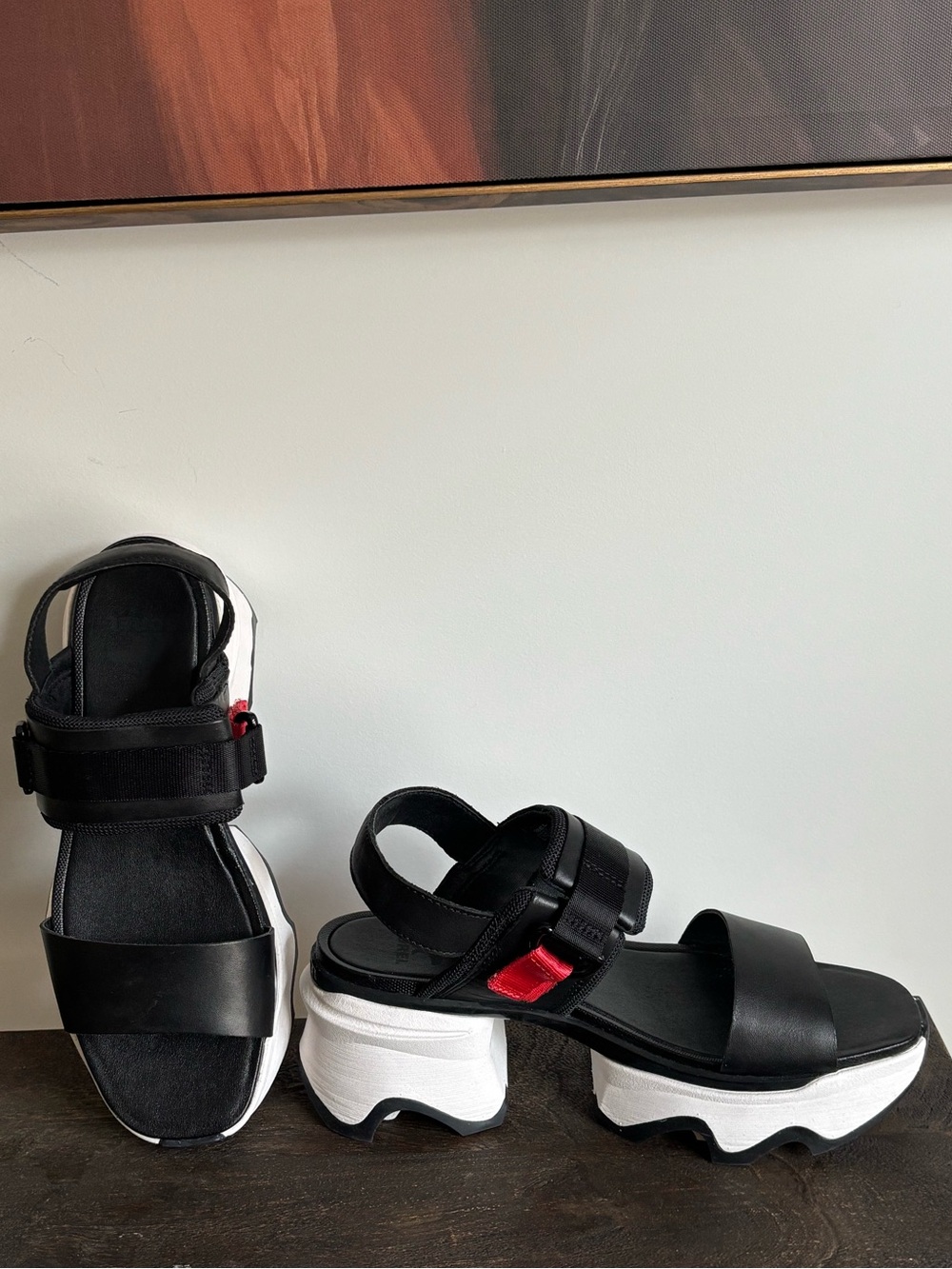 Sorel Black Platform Sandals with White Chunky Sole and Red Accent
